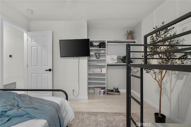 bedroom featuring light hardwood / wood-style flooring