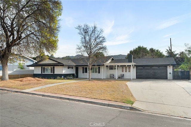 single story home featuring a garage