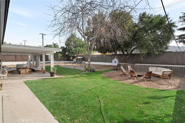 view of yard with an outdoor hangout area and a patio area