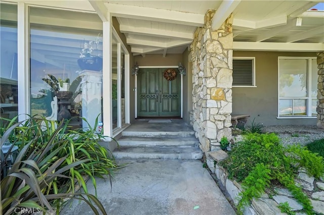 entrance to property featuring french doors