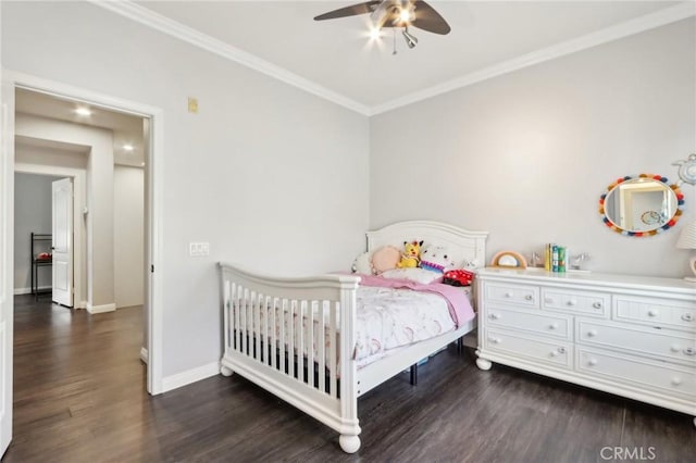 bedroom with ceiling fan, dark wood-type flooring, and crown molding