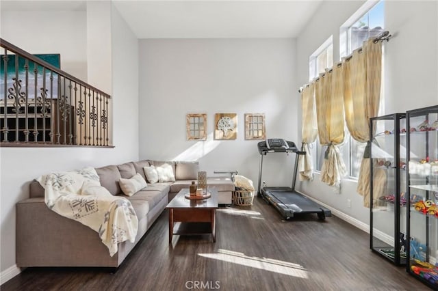 living room with dark hardwood / wood-style floors