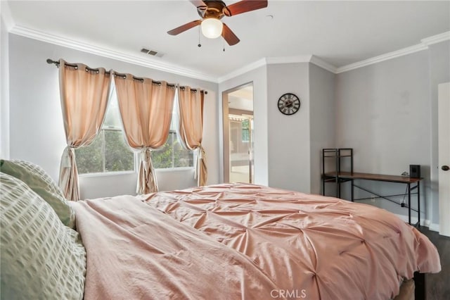 bedroom featuring ceiling fan, ensuite bathroom, and crown molding