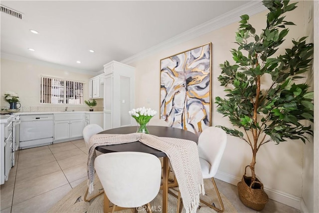 dining room featuring ornamental molding, recessed lighting, visible vents, and light tile patterned flooring