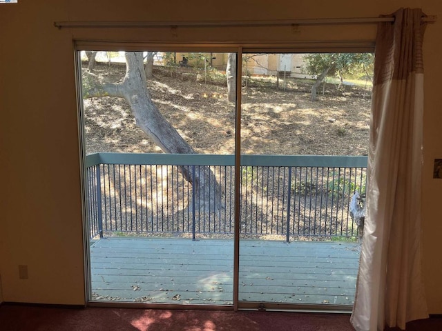 entryway featuring carpet floors