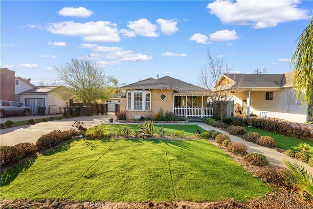 ranch-style house with a front lawn