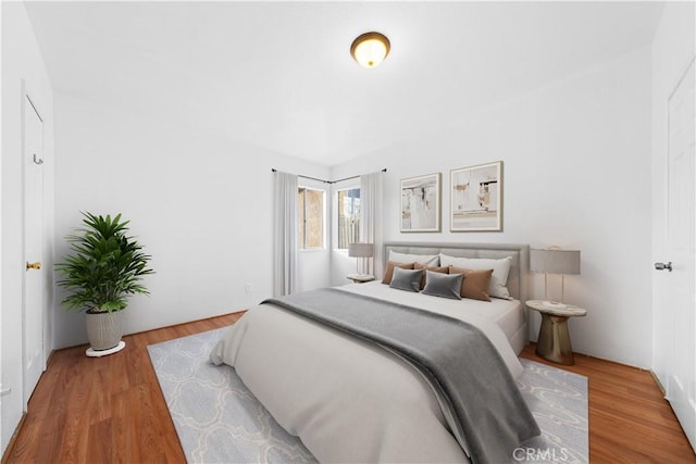 bedroom featuring hardwood / wood-style floors