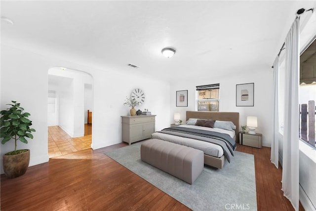 bedroom featuring hardwood / wood-style flooring