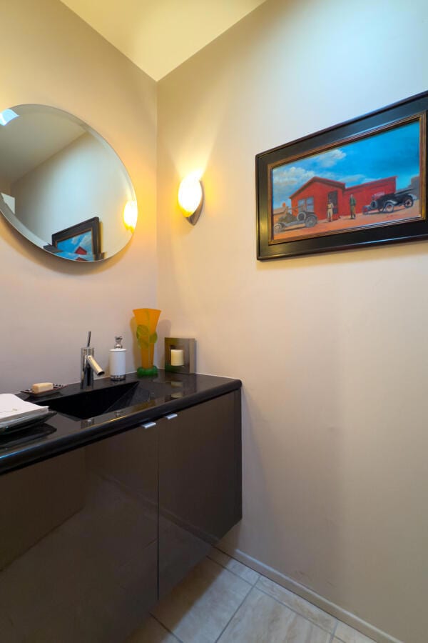 bathroom featuring vanity and tile patterned flooring