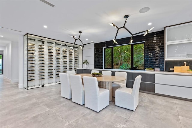 dining area with a notable chandelier