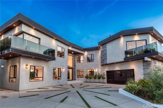 contemporary house featuring a patio