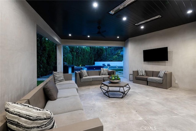 view of patio / terrace with an outdoor hangout area, ceiling fan, and a swimming pool