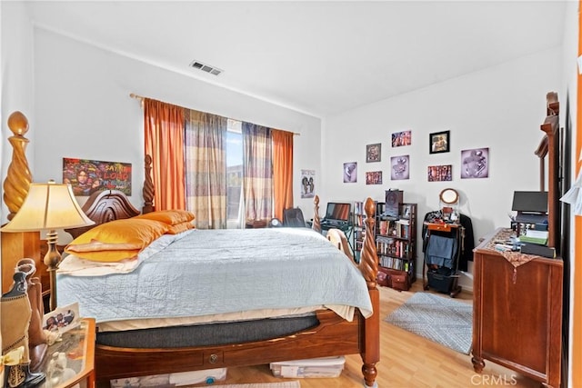 bedroom featuring light hardwood / wood-style floors