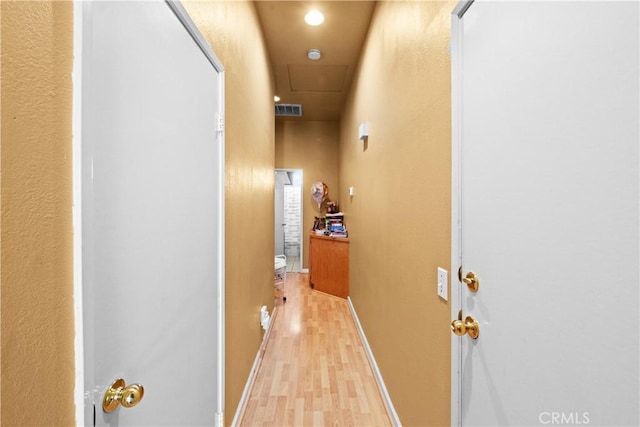 hallway featuring light hardwood / wood-style floors