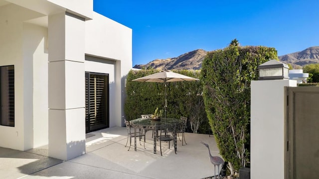 view of patio featuring a mountain view