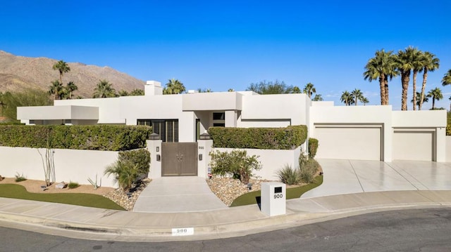 view of front of home featuring a mountain view