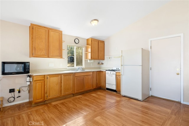 kitchen featuring lofted ceiling, white appliances, a sink, light countertops, and open shelves