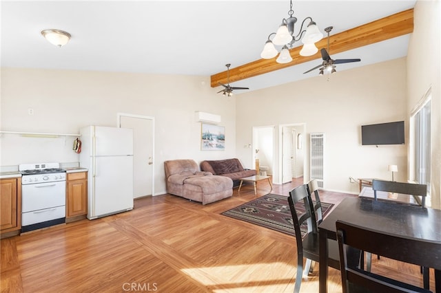 dining space featuring lofted ceiling with beams, ceiling fan, and light wood-type flooring