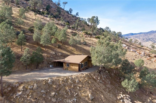 birds eye view of property with a mountain view