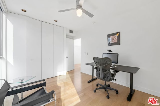 office area featuring ceiling fan and light hardwood / wood-style flooring