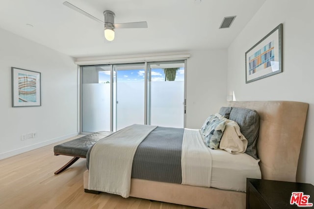 bedroom with ceiling fan, access to exterior, and light hardwood / wood-style flooring