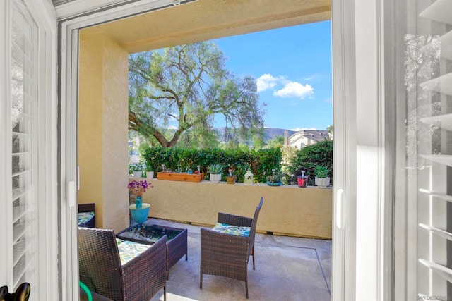 balcony with a patio area