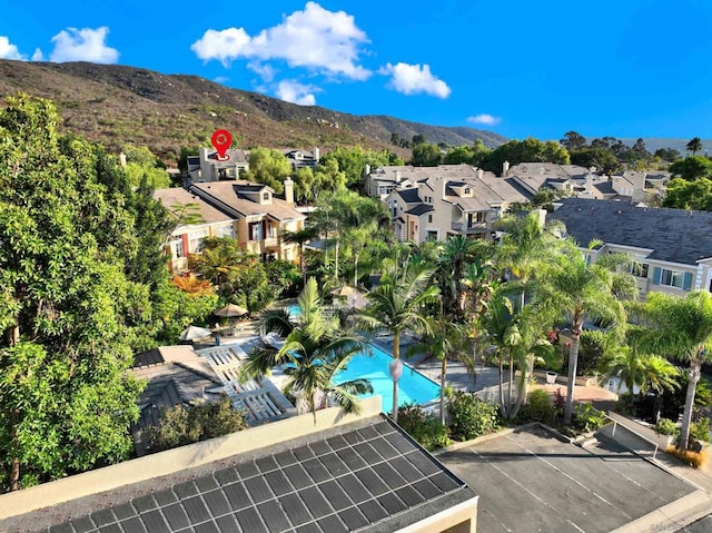 drone / aerial view featuring a mountain view