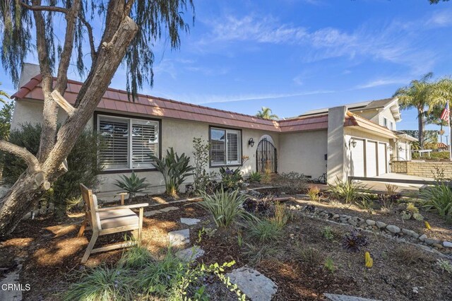 ranch-style home with a garage