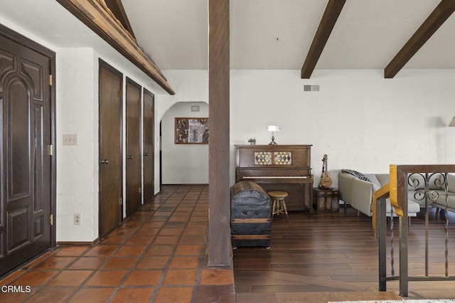 hallway with beamed ceiling