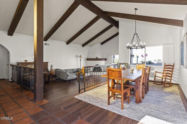 dining area with a chandelier, beam ceiling, dark hardwood / wood-style flooring, and high vaulted ceiling