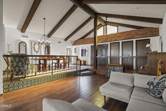 living room with high vaulted ceiling, a notable chandelier, beamed ceiling, and a textured ceiling