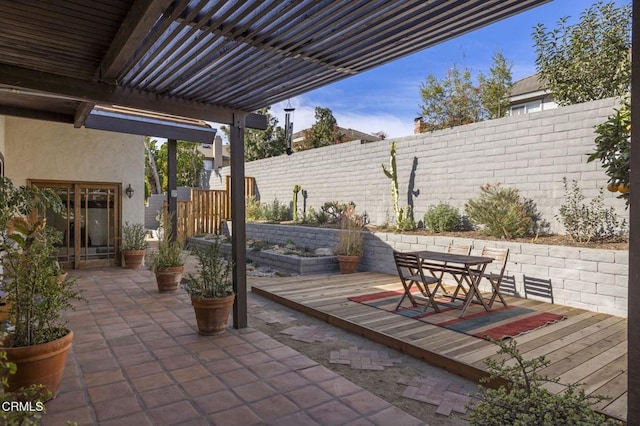 view of patio with a pergola and a wooden deck