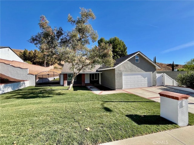 ranch-style house featuring a garage and a front lawn