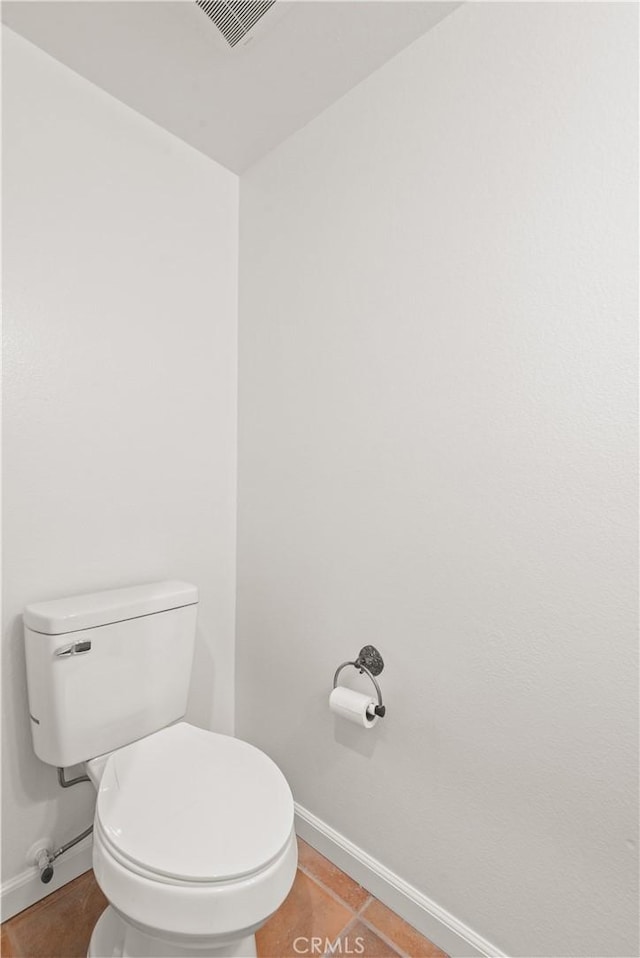 bathroom featuring tile patterned floors and toilet