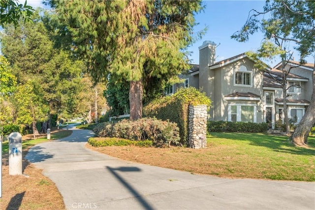 exterior space featuring a front yard