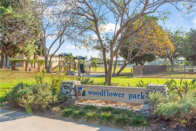 surrounding community featuring a yard and a playground