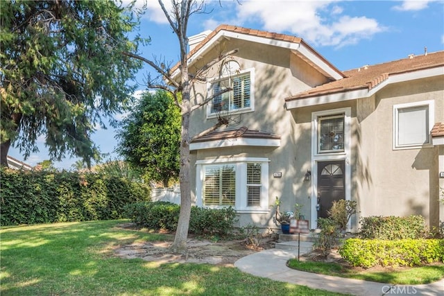 exterior space featuring a front yard