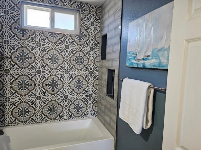 bathroom with shower / bath combination