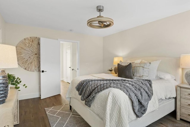 bedroom featuring dark hardwood / wood-style flooring