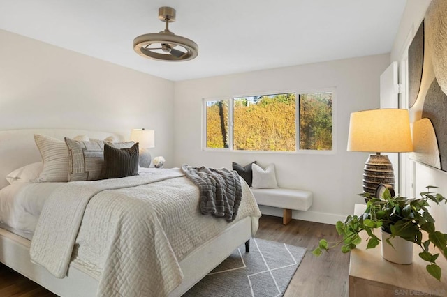 bedroom featuring dark hardwood / wood-style floors