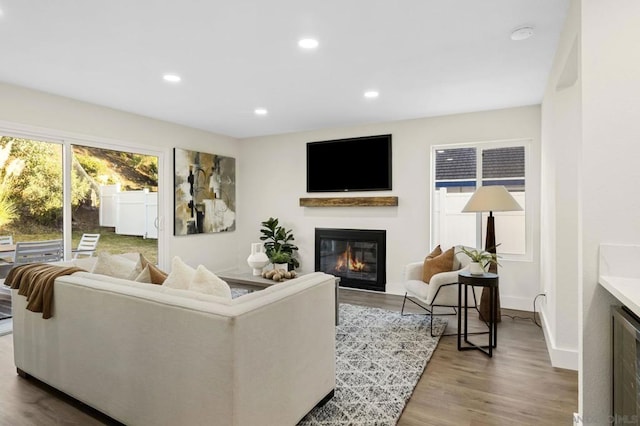 living room featuring hardwood / wood-style floors and beverage cooler