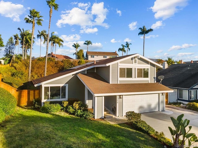 back of property featuring a yard and a garage