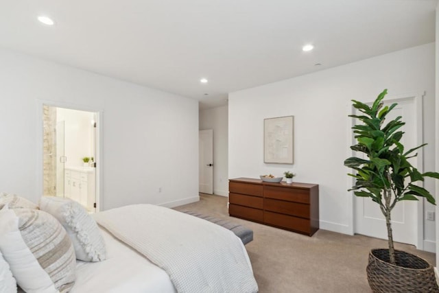 bedroom with light colored carpet