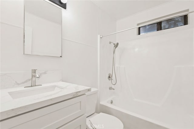 full bath featuring vanity,  shower combination, and toilet