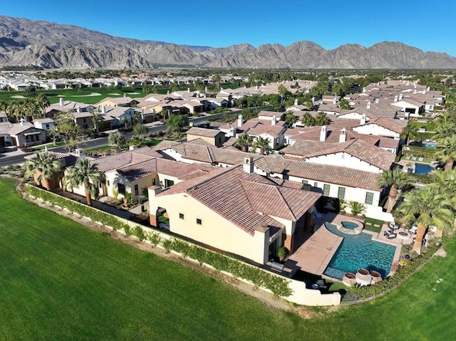 drone / aerial view featuring a mountain view