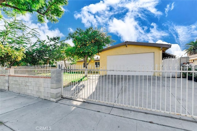 single story home featuring a garage