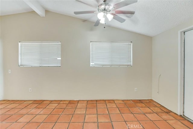 tiled spare room featuring ceiling fan, vaulted ceiling with beams, and a textured ceiling