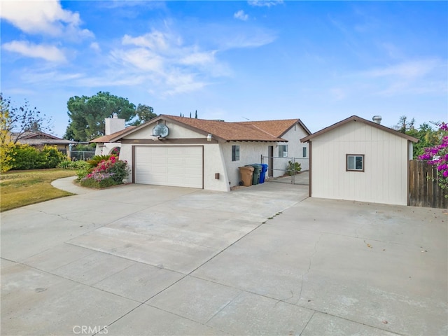 view of side of home featuring a garage