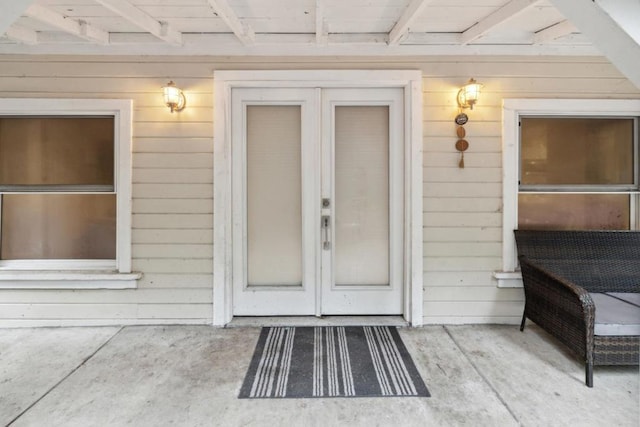 entrance to property featuring french doors