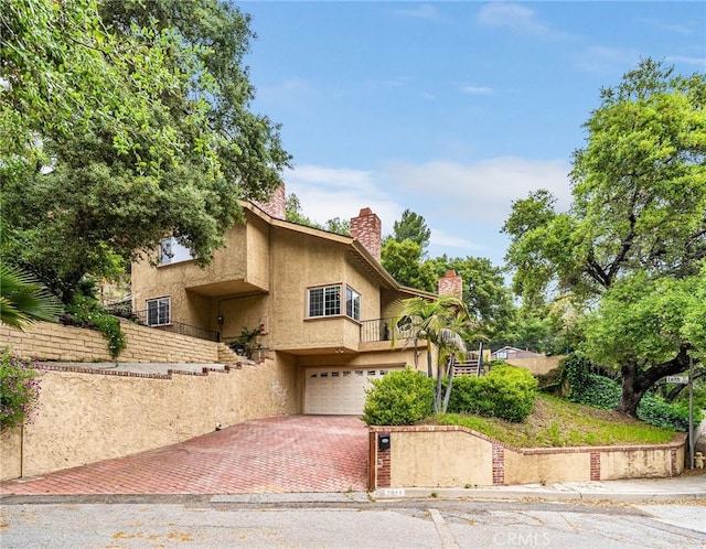 view of front of property featuring a garage